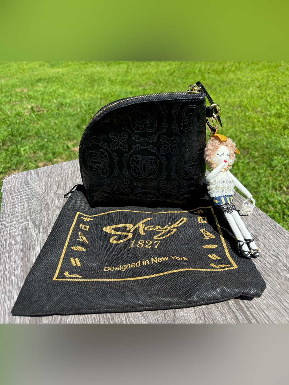 Sharif Embossed Mini Pouch with Decorative Doll Charm